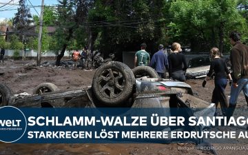 Schlammlawine Santiago – Schlammlawine wälzt sich durch eine Straße in Santiago de Chile nach heftigen Regenfällen