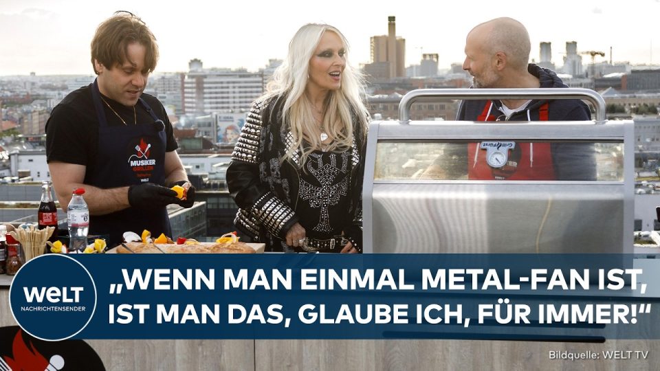Doro Pesch auf der Bühne – die Metal-Ikone singt vor Fans, im Hintergrund Bühnenlichter