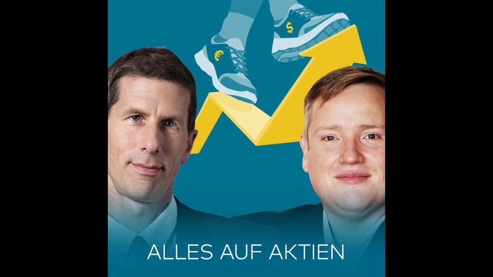 Börsenhändler beobachtet KI-Aktien-Charts auf mehreren Bildschirmen – KI-Blase im Fokus der Investoren