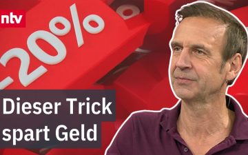 Smartphone mit Preiswecker-App und Preisverlaufskurve bei einem Online-Shopping-Angebot zum Black Friday
