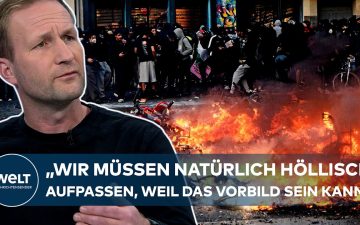 Schülerproteste in einer deutschen Großstadt – junge Menschen mit Schildern, Polizei sichert die Demonstration ab