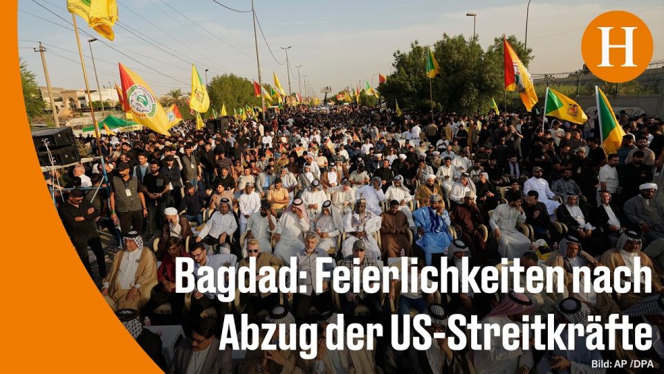 US-Truppenabzug Irak – Feiernde Menschen auf den Straßen von Bagdad beim US-Truppenabzug aus dem Irak